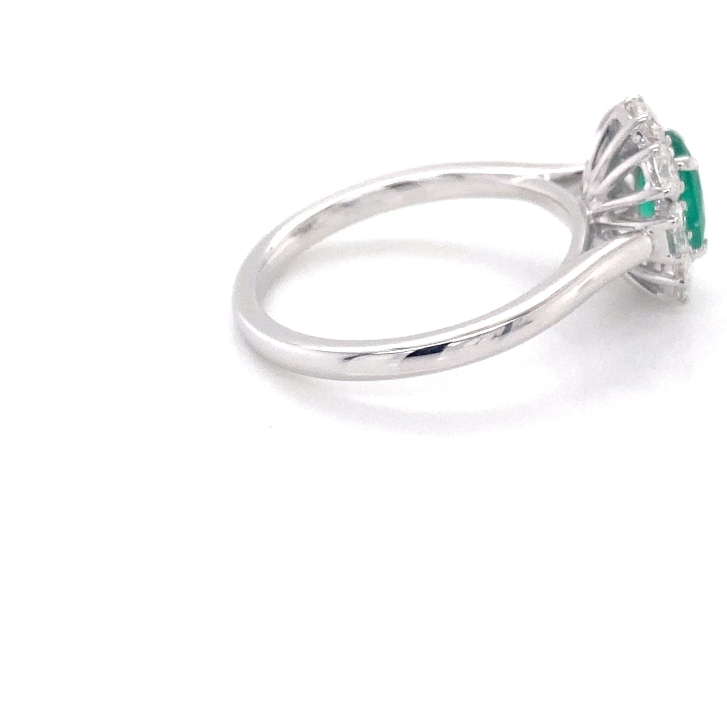 Oval shaped emerald and oval diamond cluster style ring Gardiner Brothers