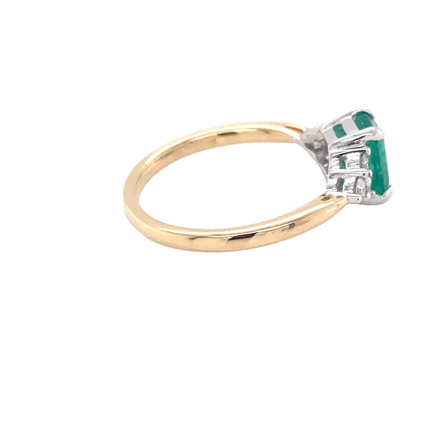 Octagonal shaped emerald and round brilliant cut diamond ring Gardiner Brothers