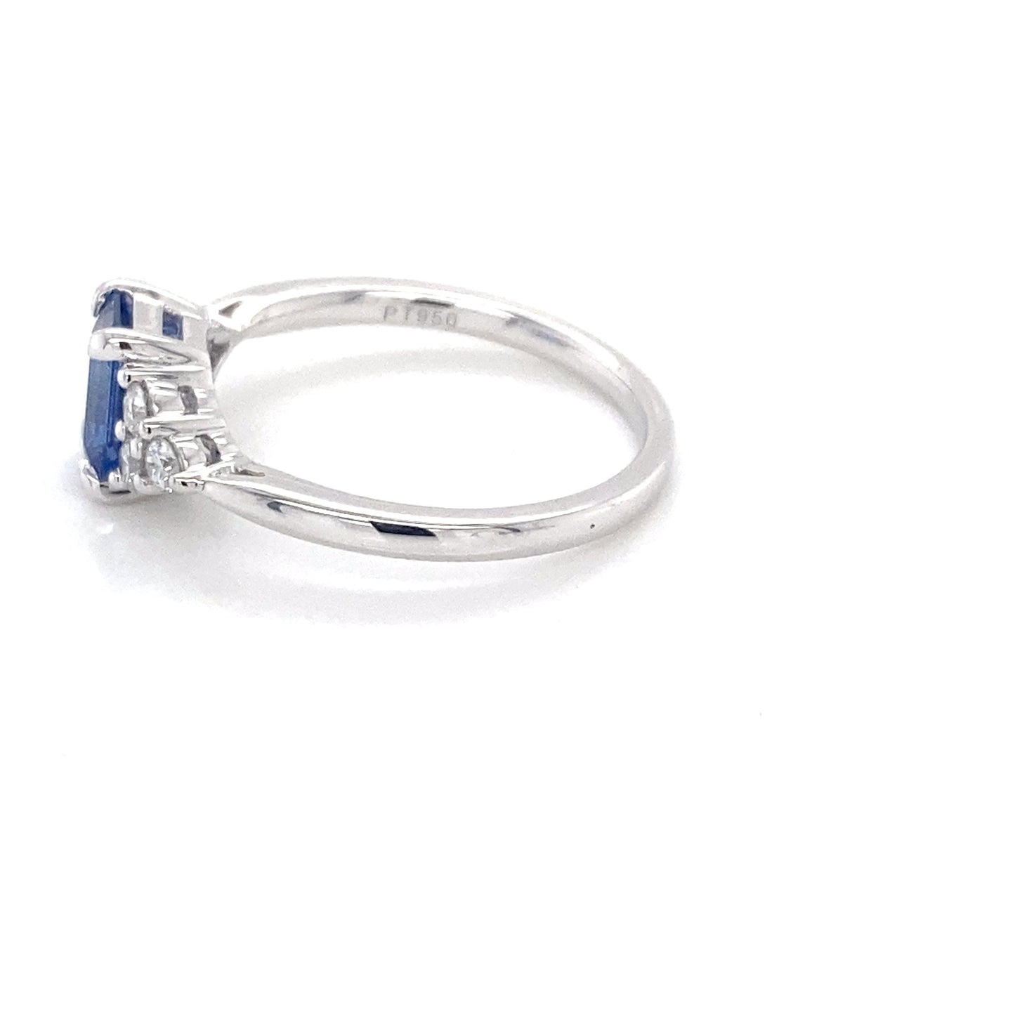 Octagonal shaped sapphire and 6 round brilliant cut diamond ring Gardiner Brothers