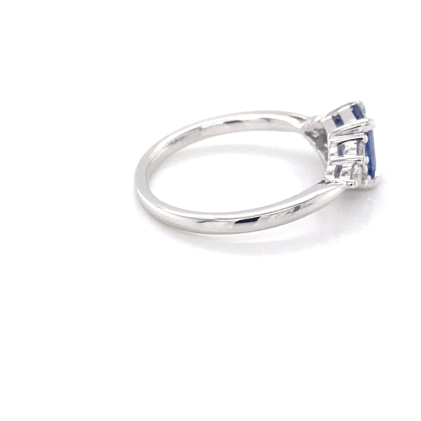 Octagonal shaped sapphire and 6 round brilliant cut diamond ring Gardiner Brothers