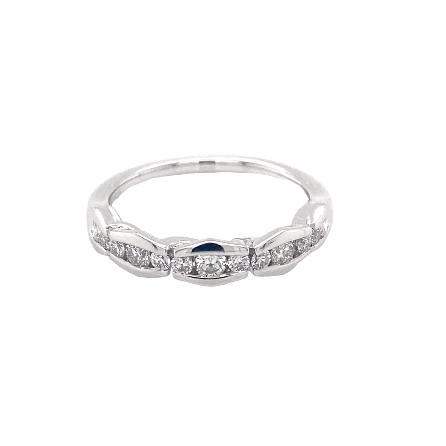 Platinum round brilliant cut diamond alternating size eternity ring Gardiner Brothers