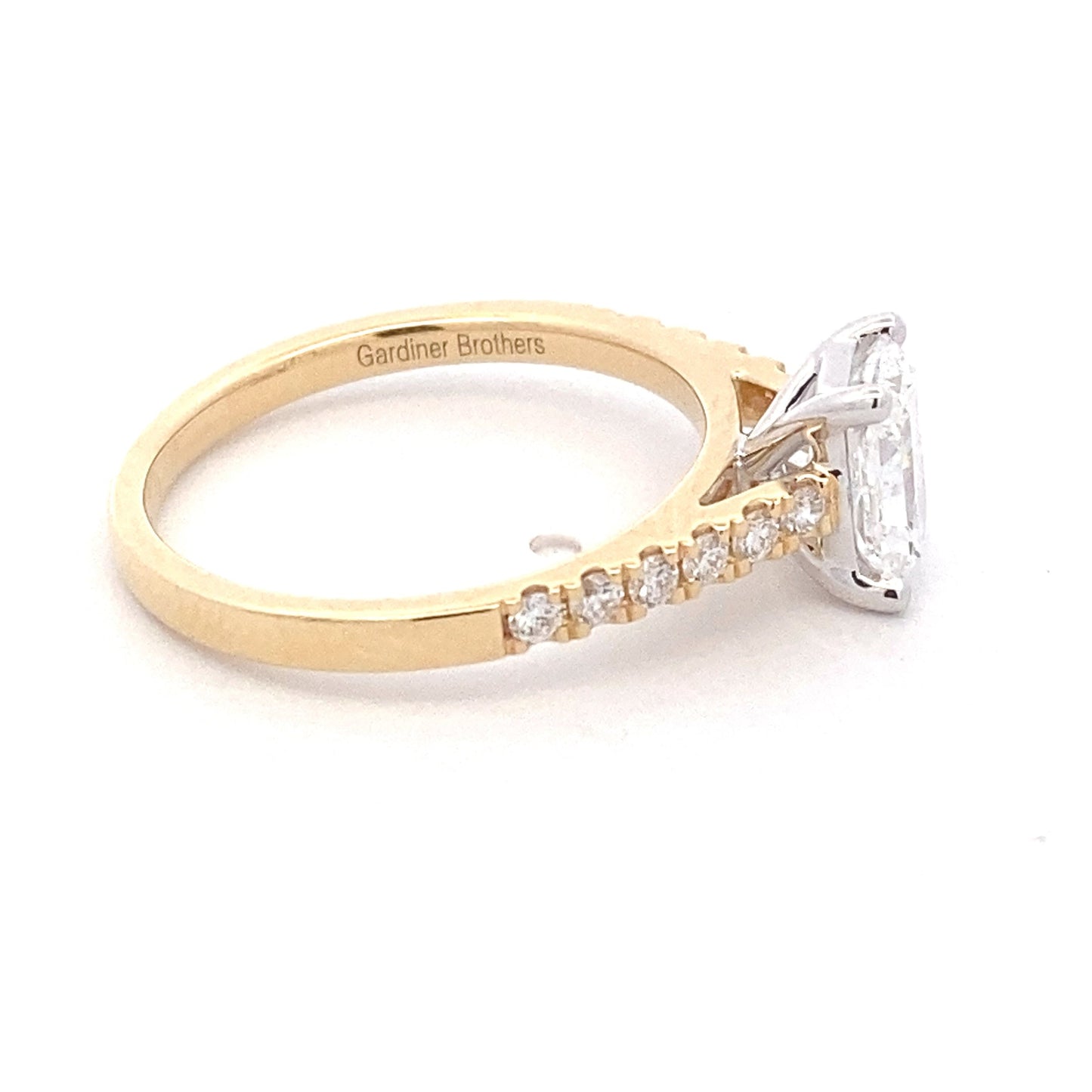 Radiant cut diamond solitaire ring with round brilliant cut diamond set shoulders - 1.26cts Gardiner Brothers