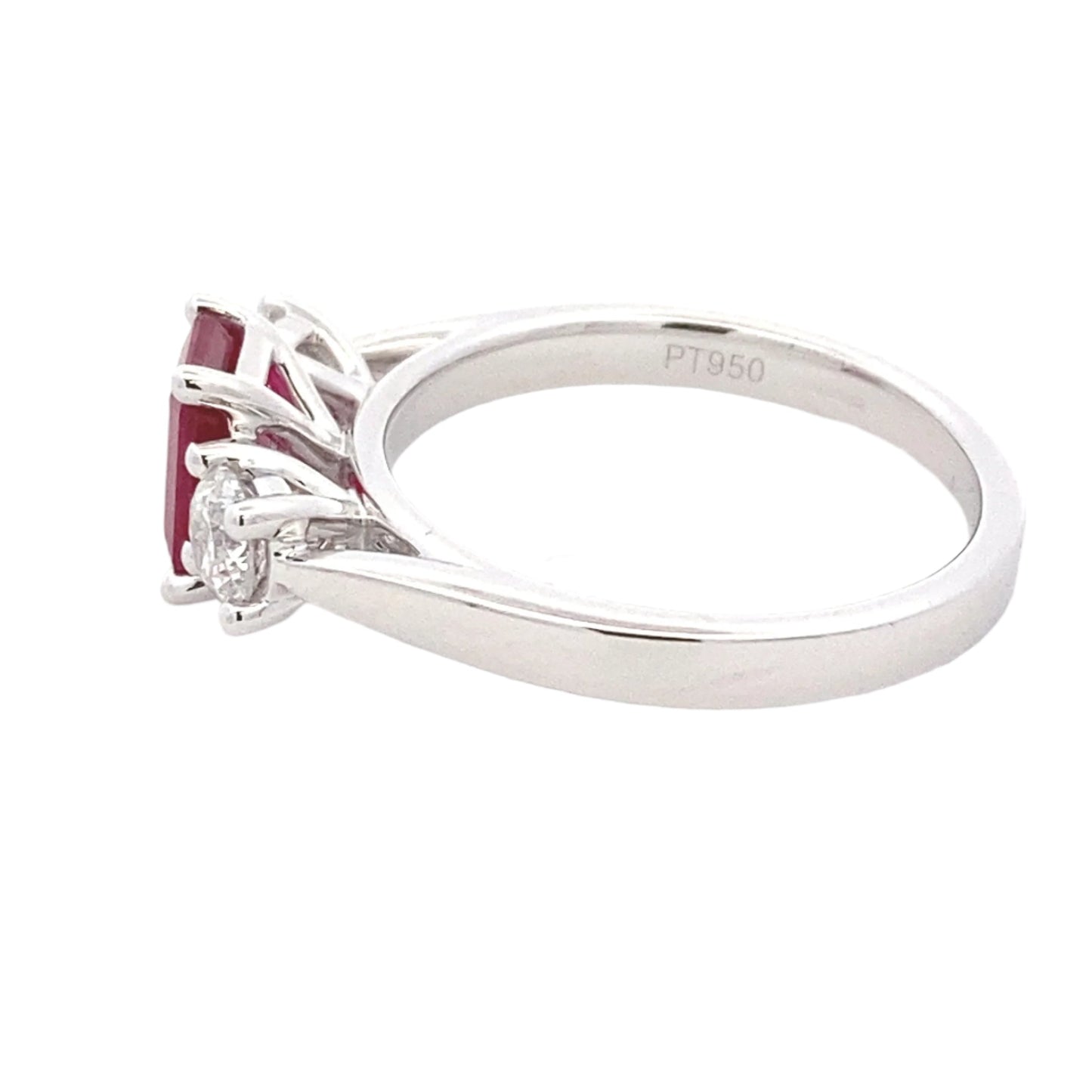 Octagonal Ruby and round brilliant cut diamond 3 stone ring Gardiner Brothers