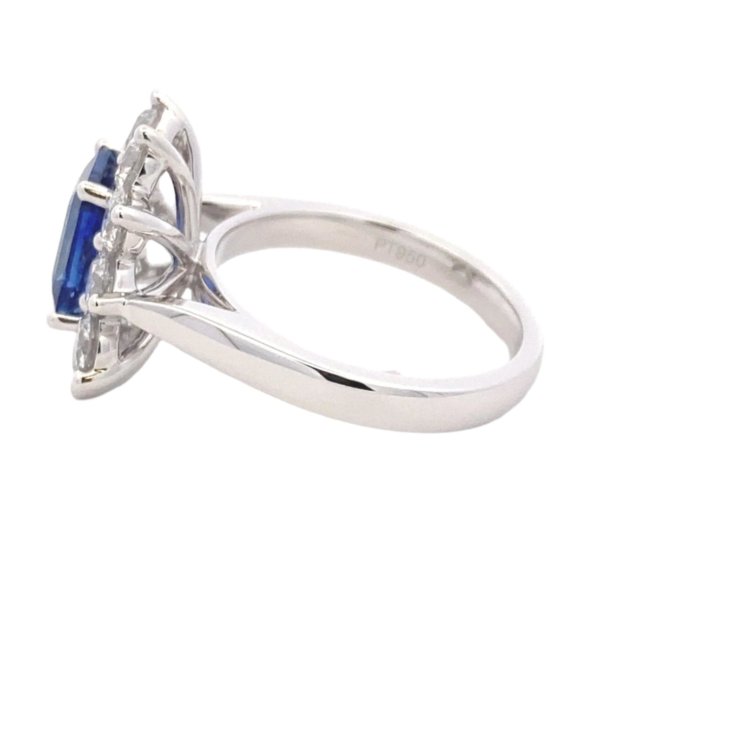 Octagonal shaped sapphire and round brilliant cut diamond cluster style ring Gardiner Brothers