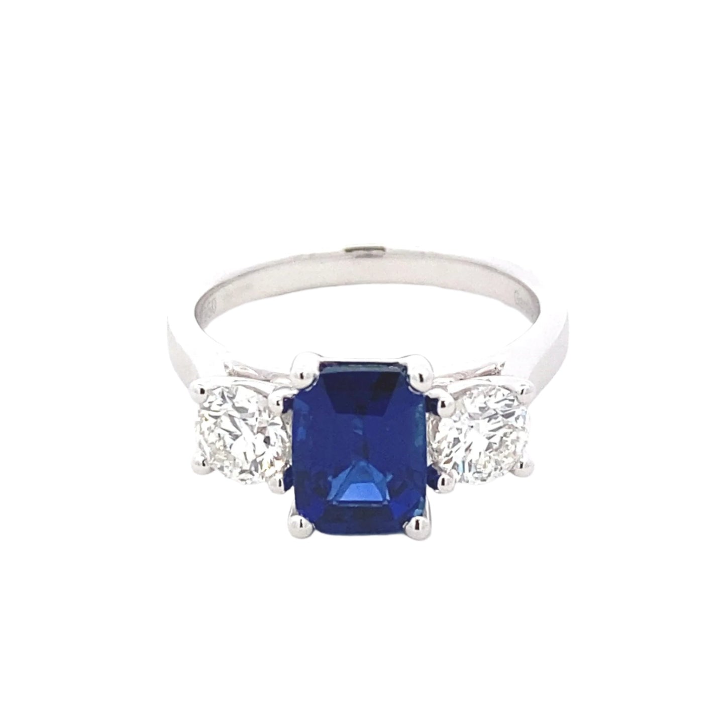 Octagonal Shaped Sapphire and round brilliant cut diamond 3 stone ring Gardiner Brothers
