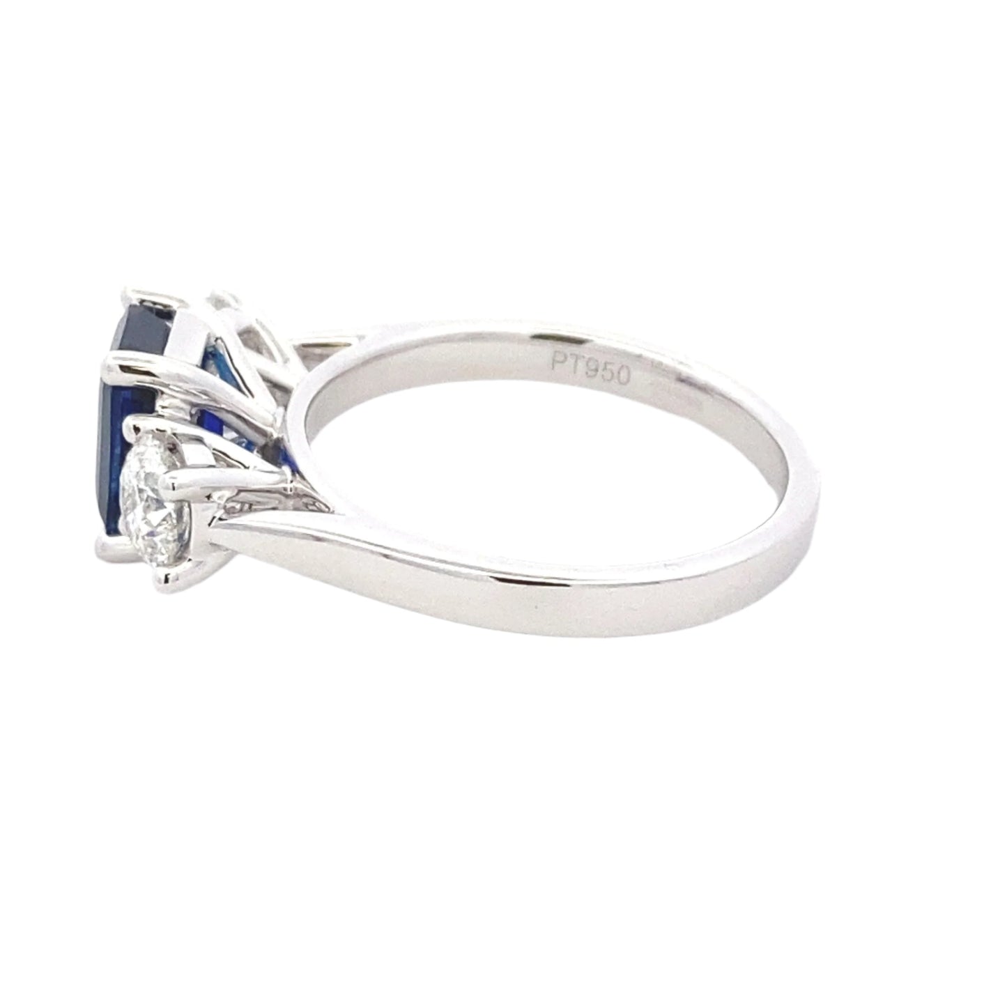 Octagonal Shaped Sapphire and round brilliant cut diamond 3 stone ring Gardiner Brothers