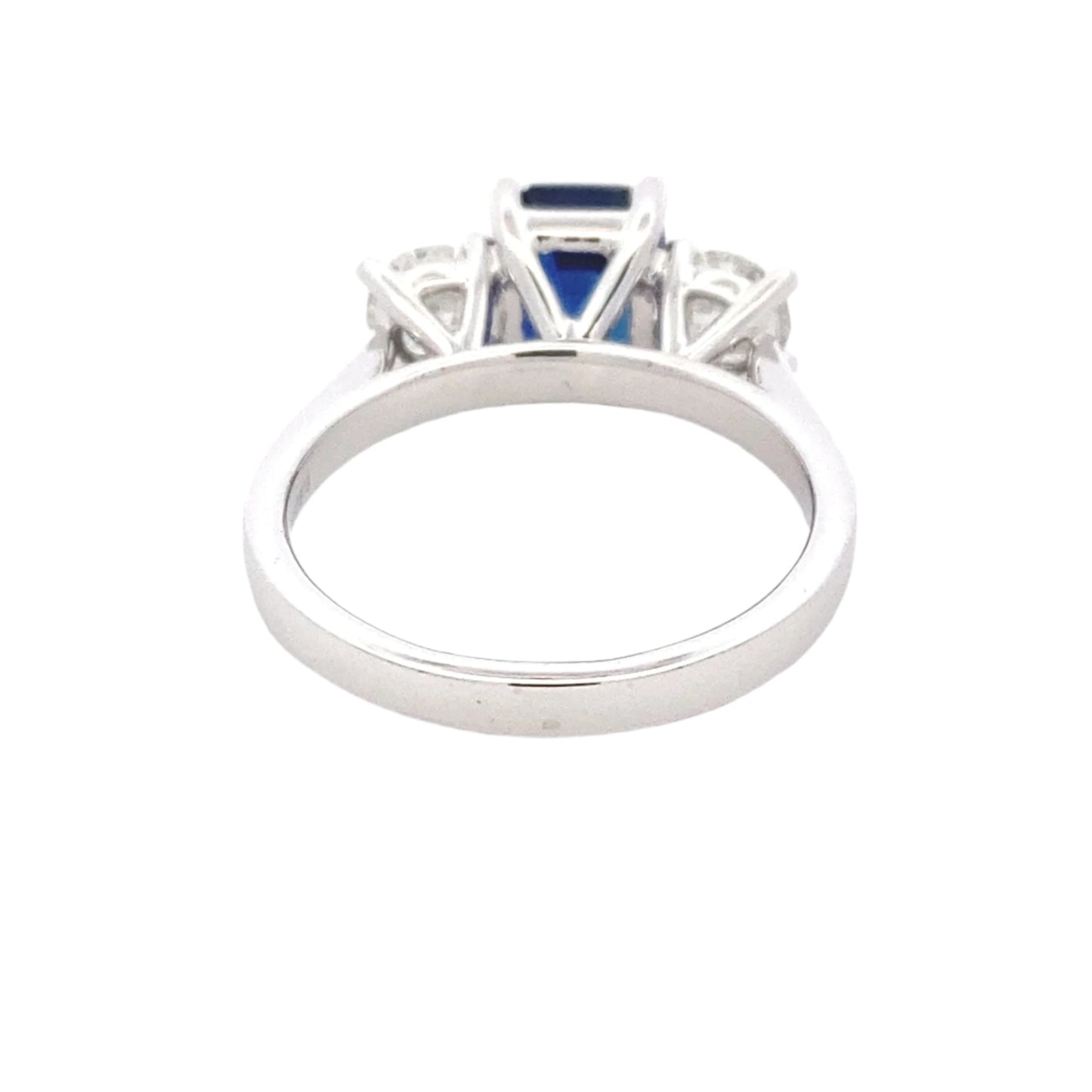 Octagonal Shaped Sapphire and round brilliant cut diamond 3 stone ring Gardiner Brothers