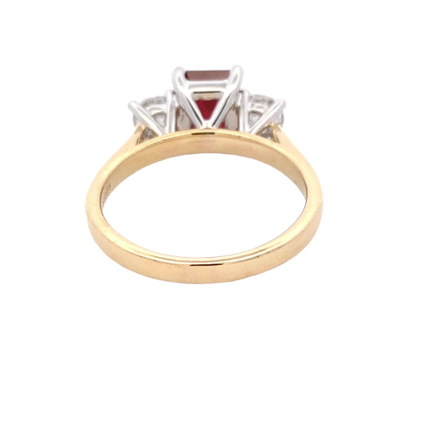 Octagonal Ruby and round brilliant cut diamond 3 stone ring Gardiner Brothers