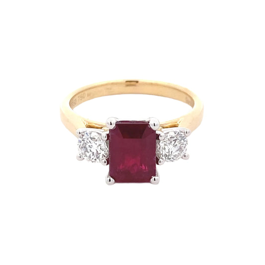 Octagonal Ruby and round brilliant cut diamond 3 stone ring Gardiner Brothers