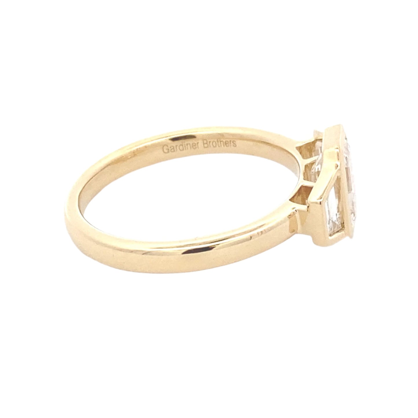 Emerald cut and Trapezoid diamond 3 stone ring - 1.34cts Gardiner Brothers
