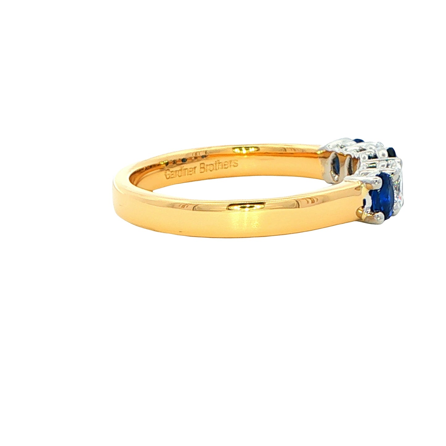 Sapphire and diamond oval shaped 5 stone ring