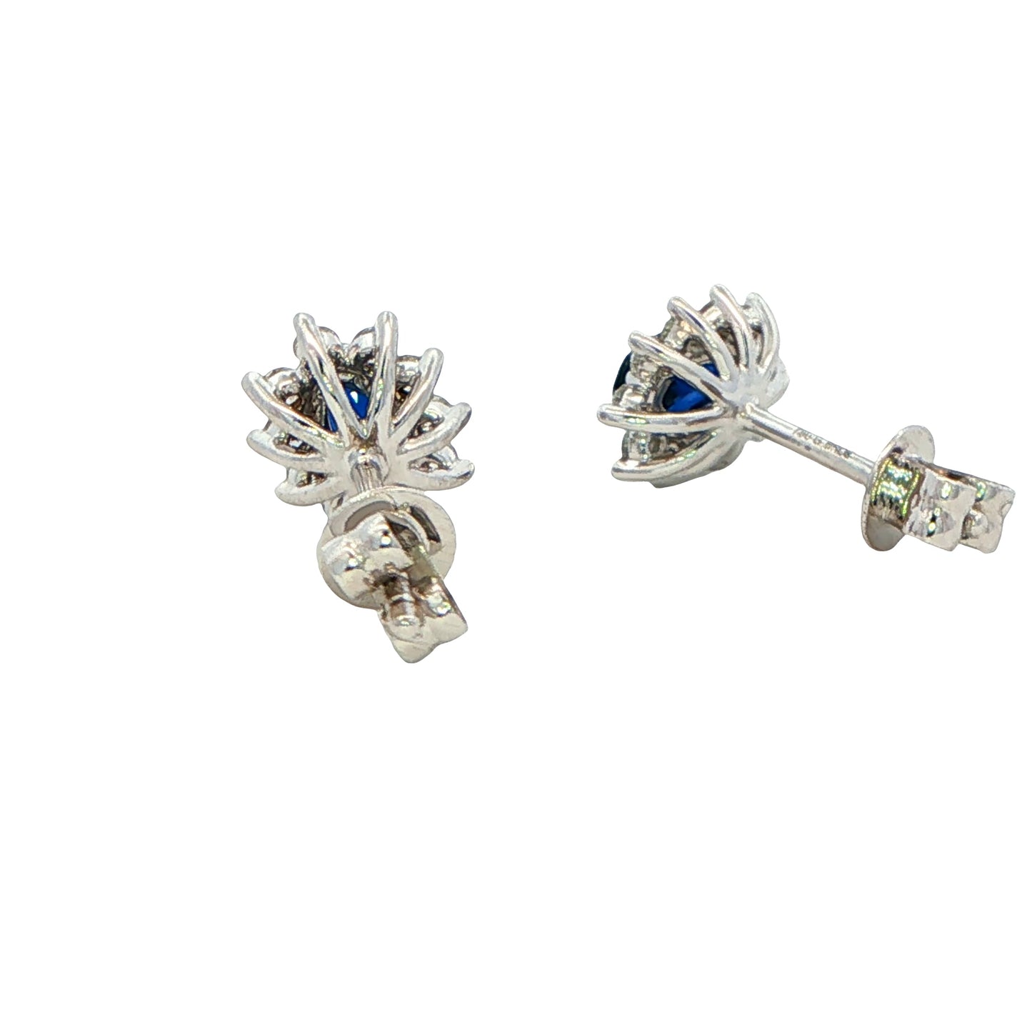 Oval shaped sapphire and round brilliant cut diamond cluster style earring