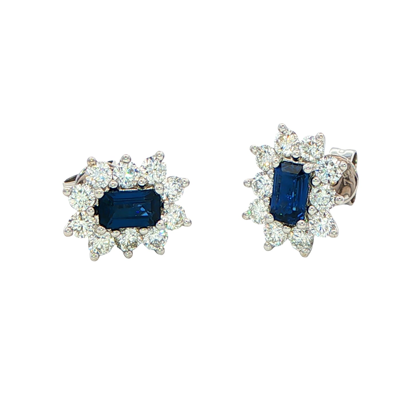 Octagonal shaped sapphire and round brilliant cut diamond cluster style earrings.