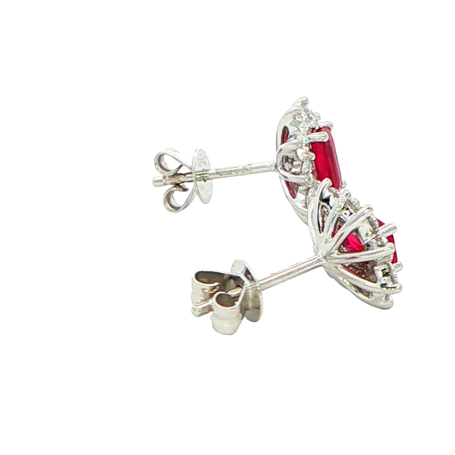 Octagonal shaped Ruby and round brilliant cut diamond cluster style earrings