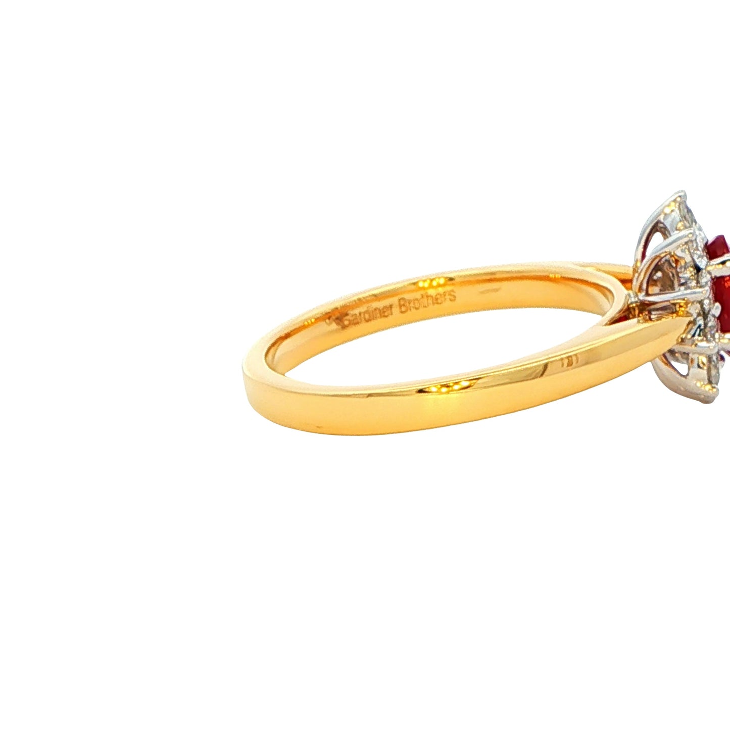 Oval Ruby and round brilliant Diamond Cluster Ring gardiner-brothers