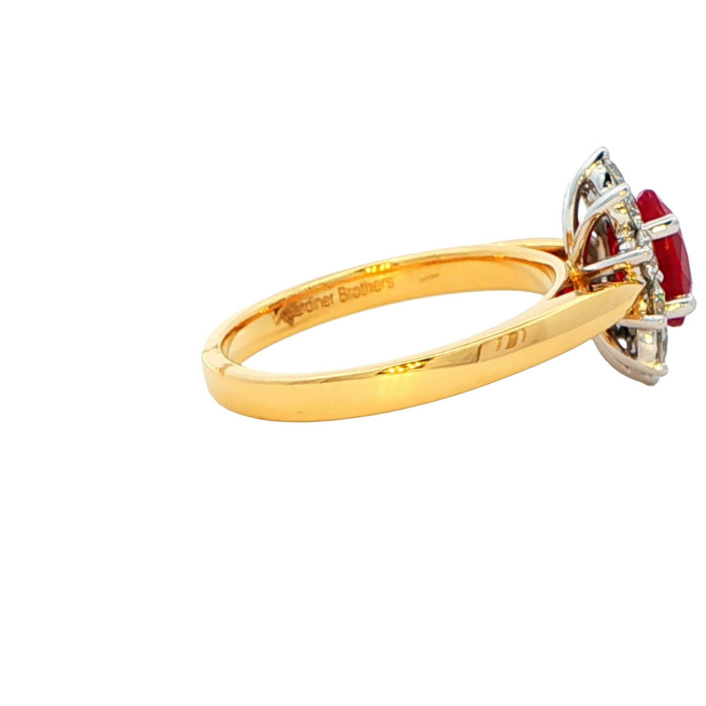 Oval Ruby and round brilliant cut Diamond Cluster Ring gardiner-brothers