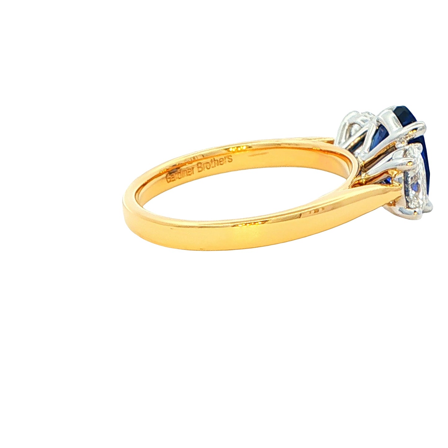 Oval shaped Sapphire and oval diamond 3 stone ring Gardiner Brothers