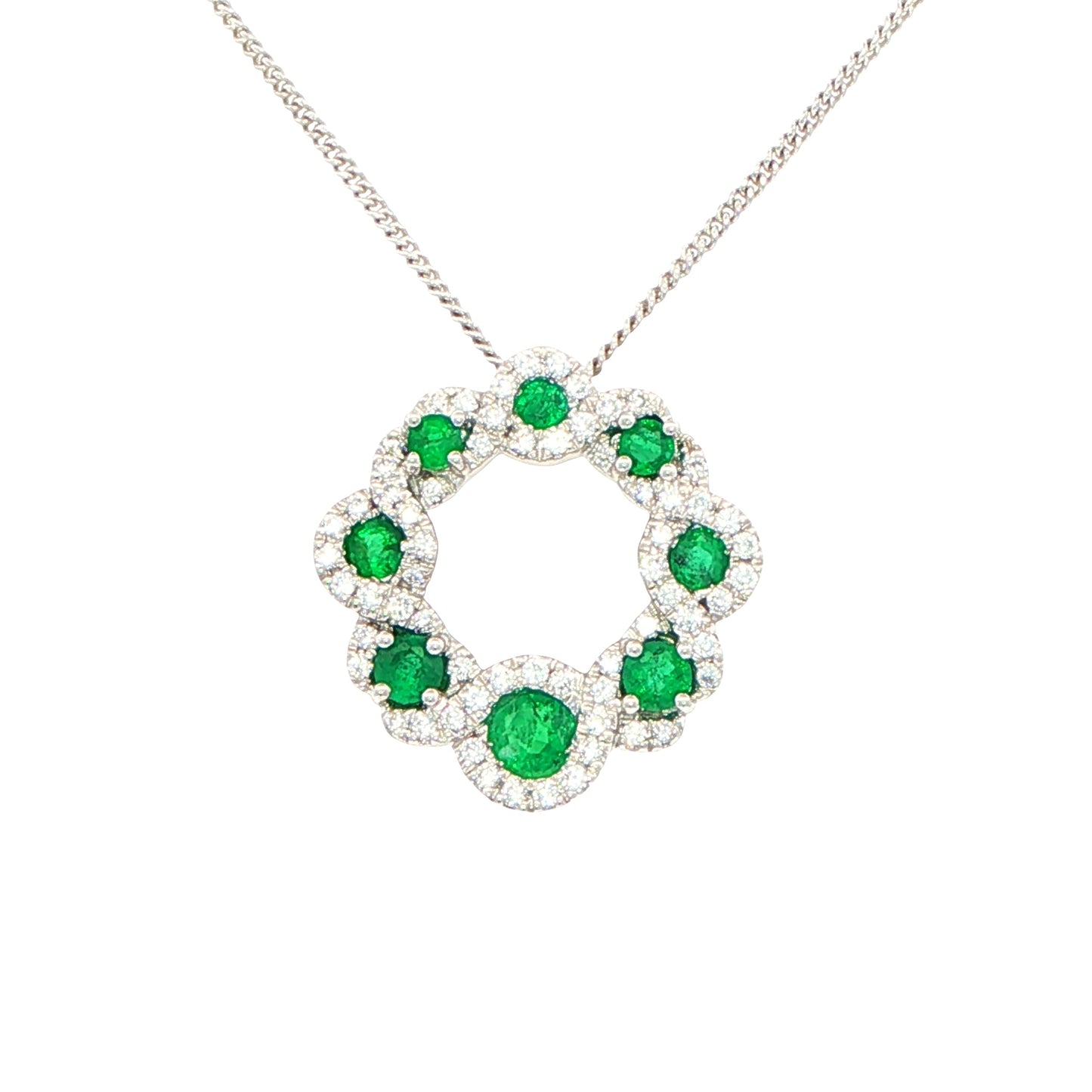 Emerald and diamond halo style circle pendant Gardiner Brothers