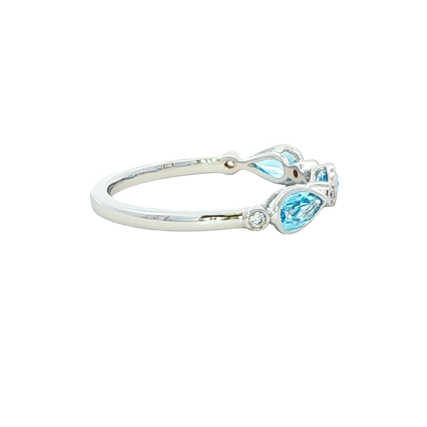 Pear Shape Swiss Blue Topaz and round brilliant cut diamond dress ring