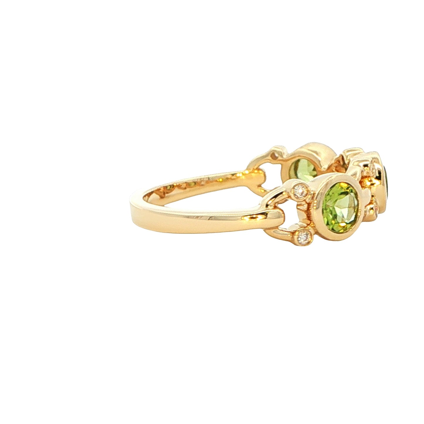 Peridot and round brilliant cut diamond dress ring