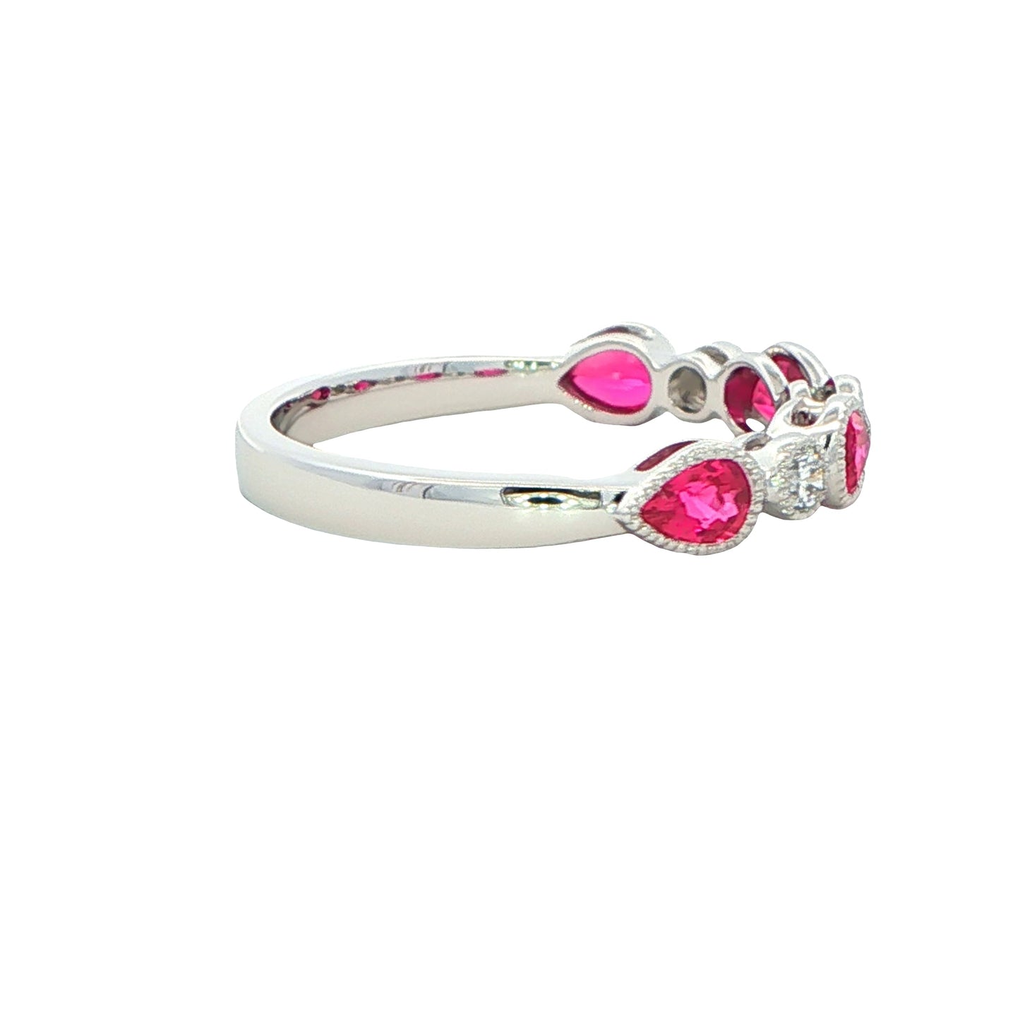 Pear Shaped Ruby and round brilliant cut diamond ring Gardiner Brothers