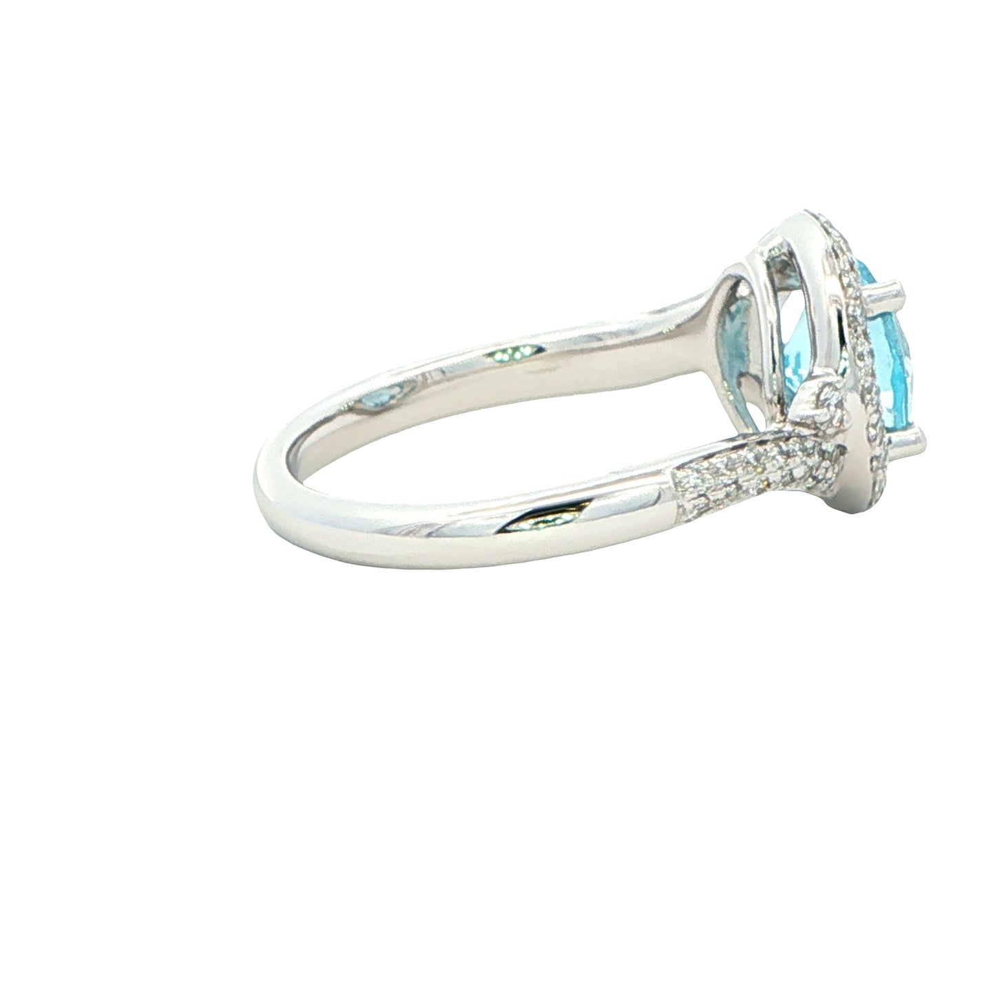 Aquamarine and round brilliant cut diamond halo cluster ring