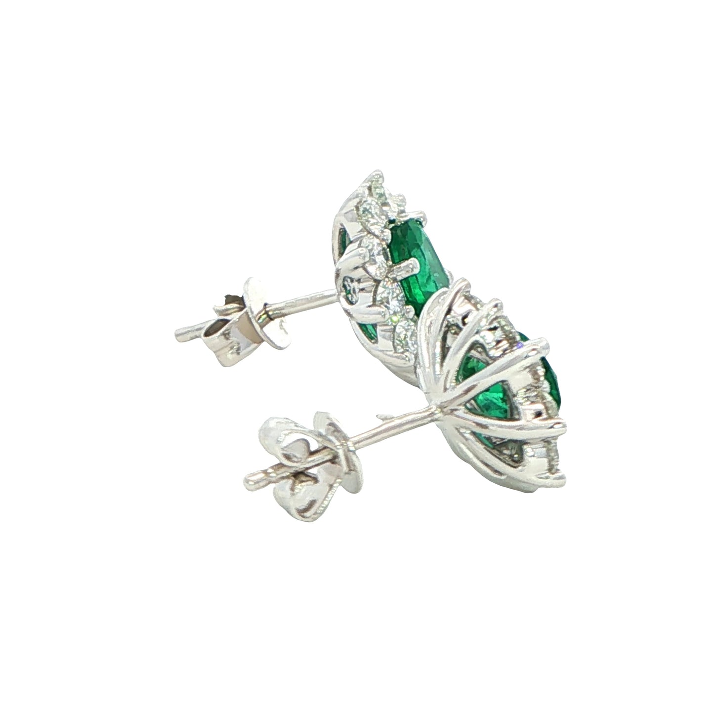 Oval shaped emerald and round brilliant cut diamond cluster style earrings Gardiner Brothers