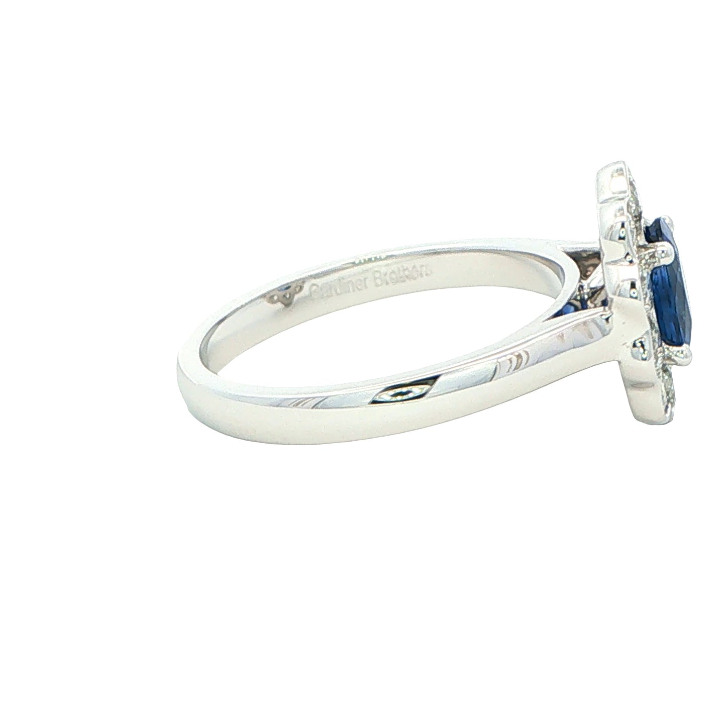 Oval shaped Sapphire and Diamond Cluster Style Ring