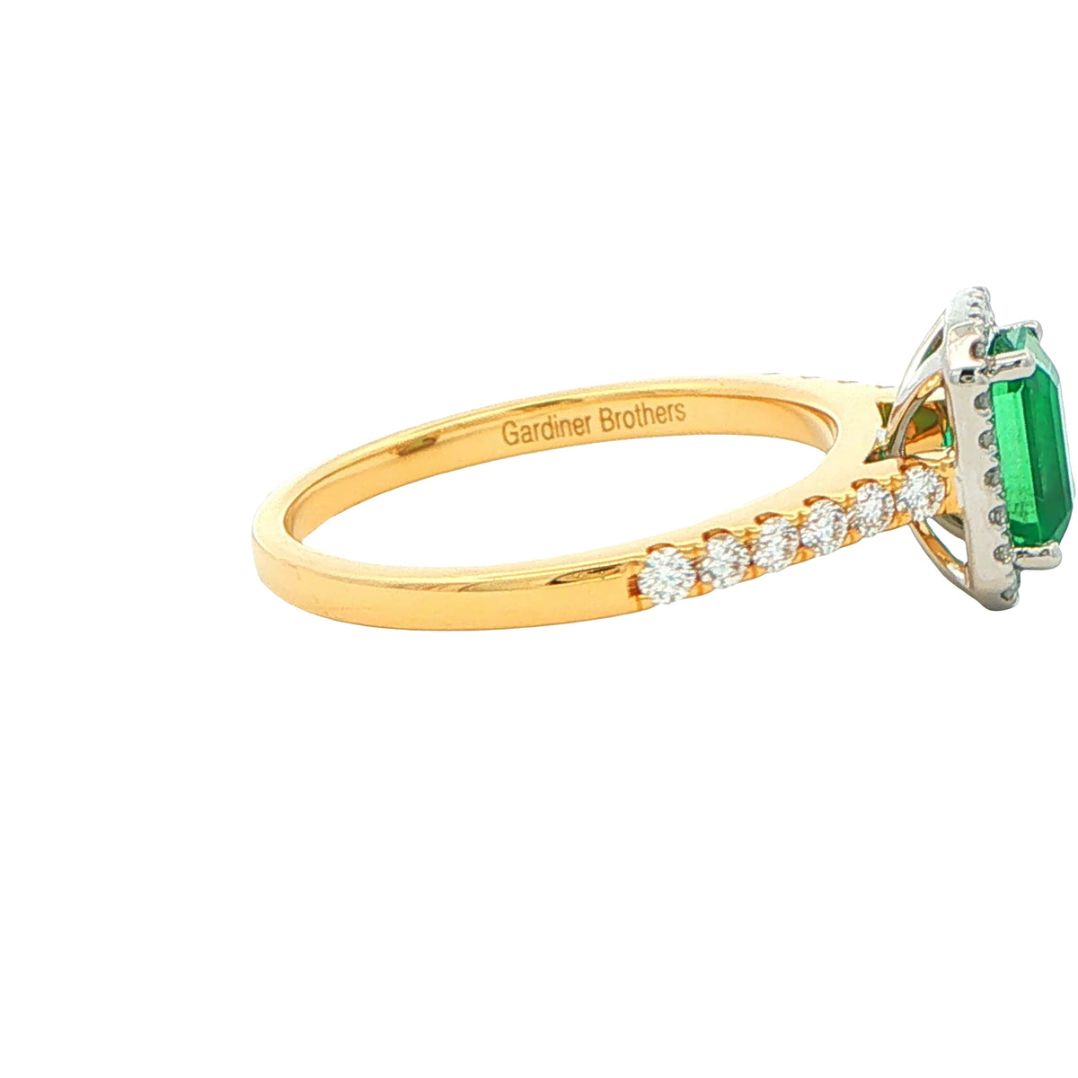 Octagonal Shaped Emerald and Diamond Halo Style Ring Gardiner Brothers