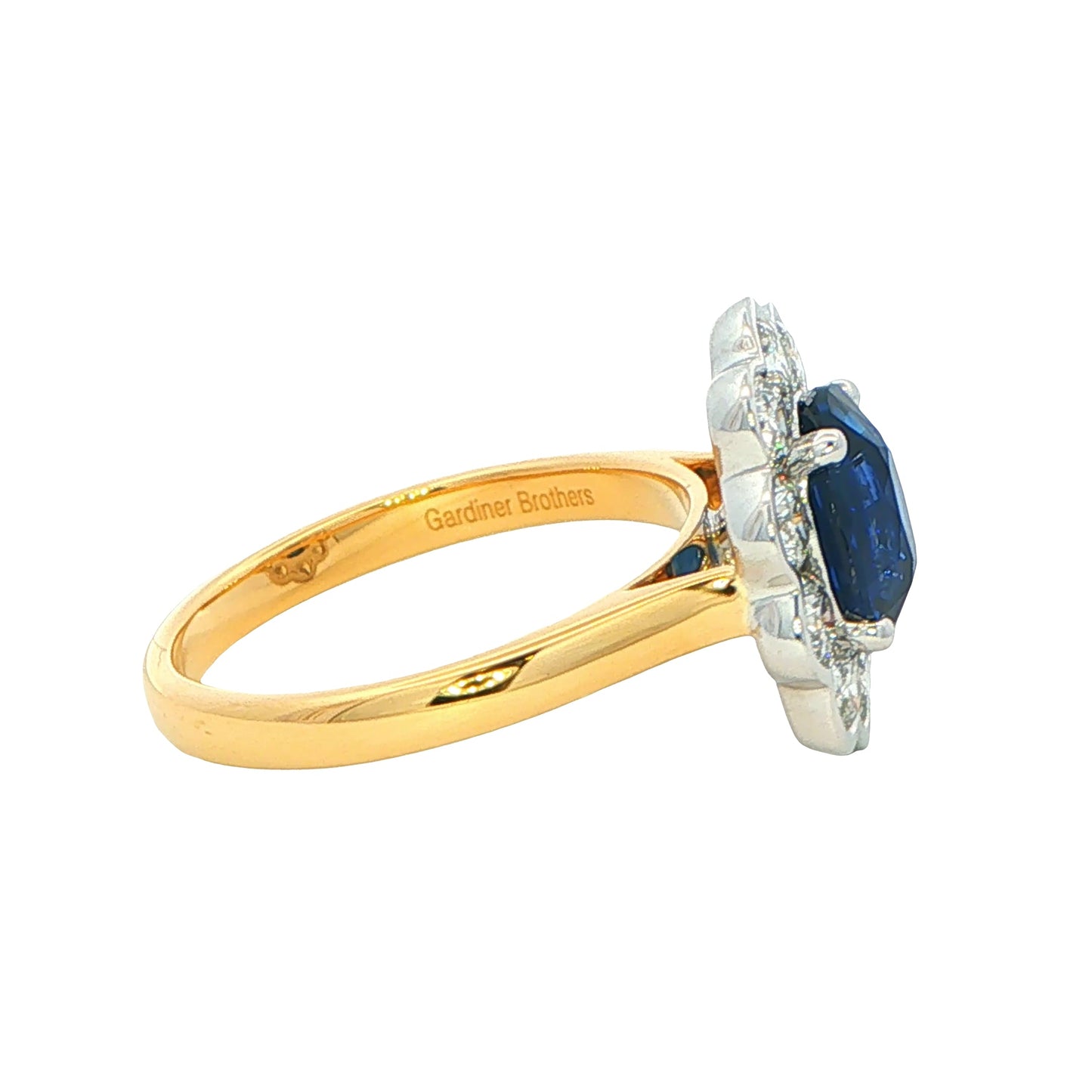 Oval Sapphire and Diamond Modern Cluster Style Ring Gardiner Brothers