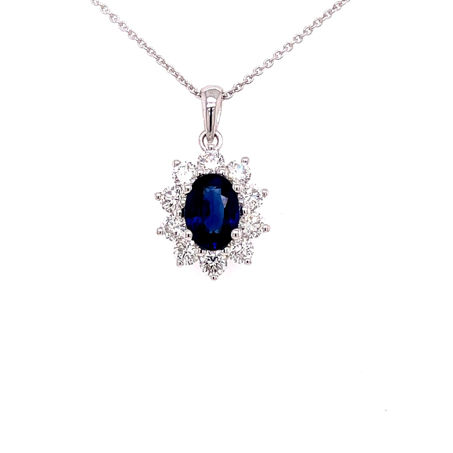 Sapphire and Round Brilliant Cut Diamond Cluster Style Pendant Gardiner Brothers