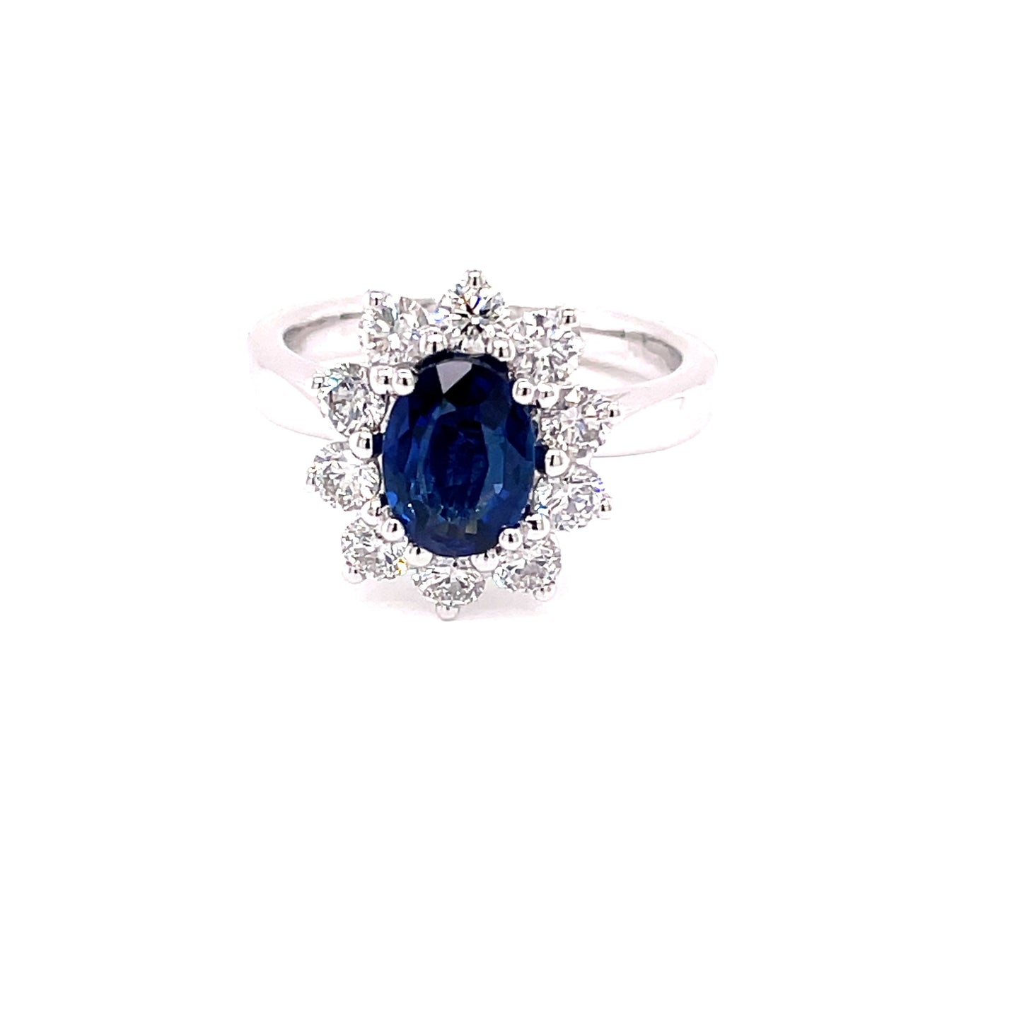 Sapphire and Round Brilliant Cut Diamond Cluster Ring Gardiner Brothers