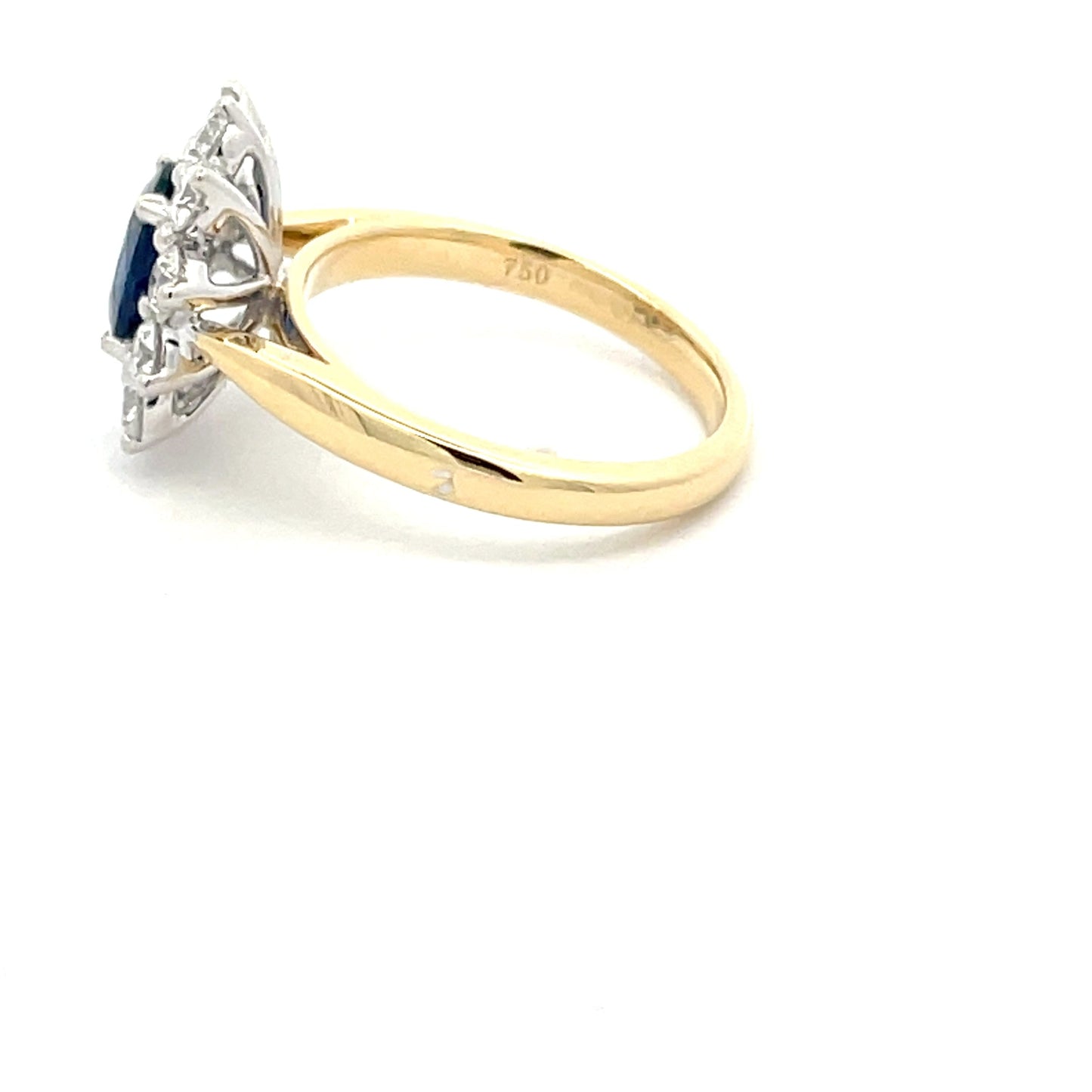 SAPPHIRE AND ROUND BRILLIANT CUT DIAMOND CLUSTER STYLE RING Gardiner Brothers