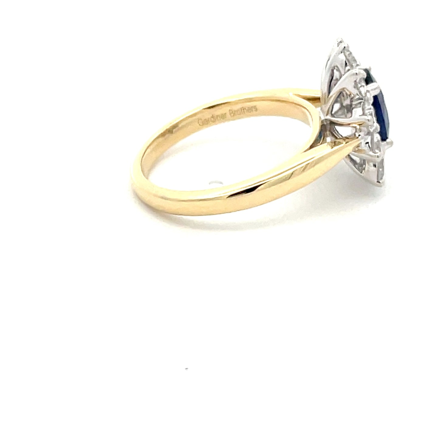 SAPPHIRE AND ROUND BRILLIANT CUT DIAMOND CLUSTER STYLE RING Gardiner Brothers