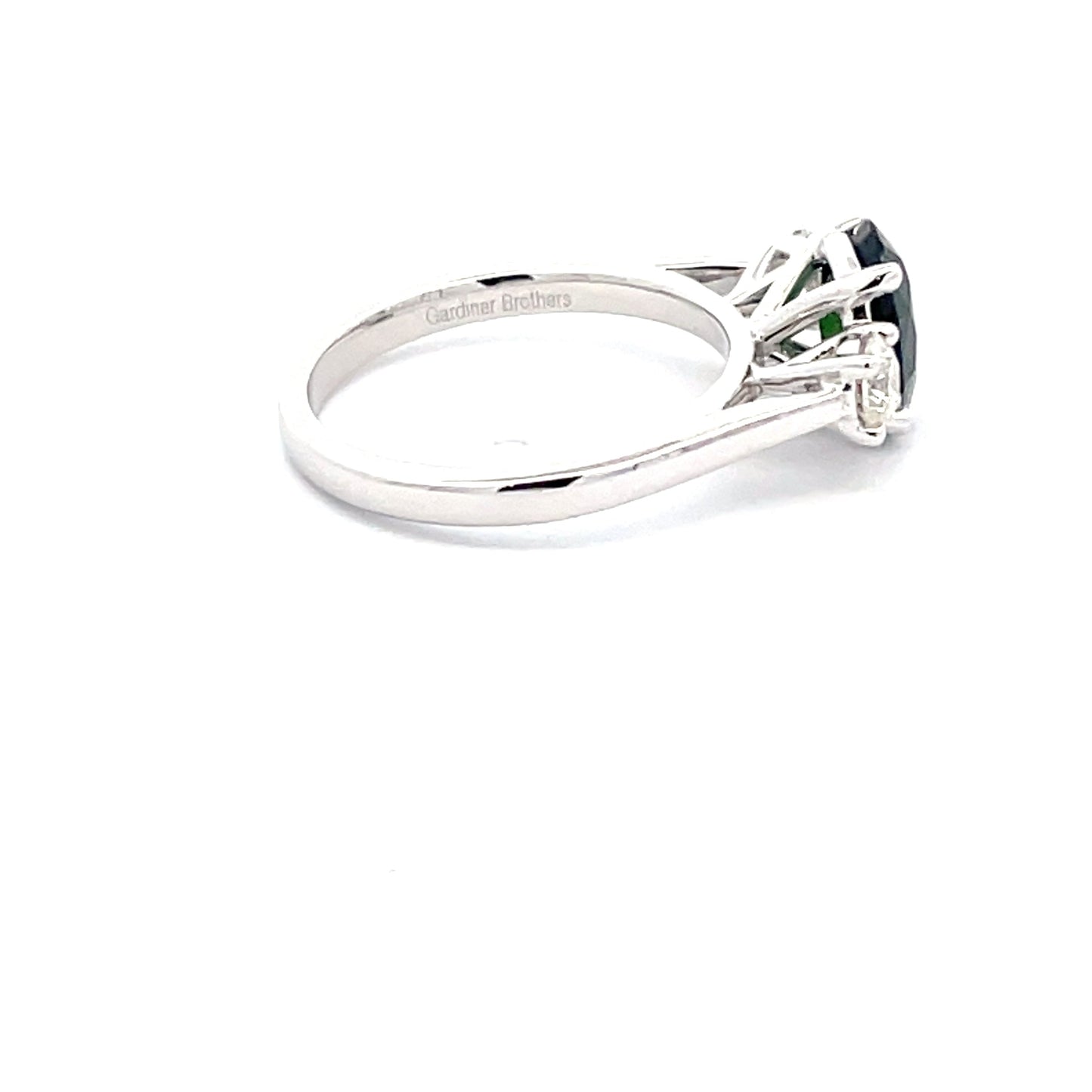 Teal Sapphire and Round Brilliant cut diamond 3 stone ring Gardiner Brothers