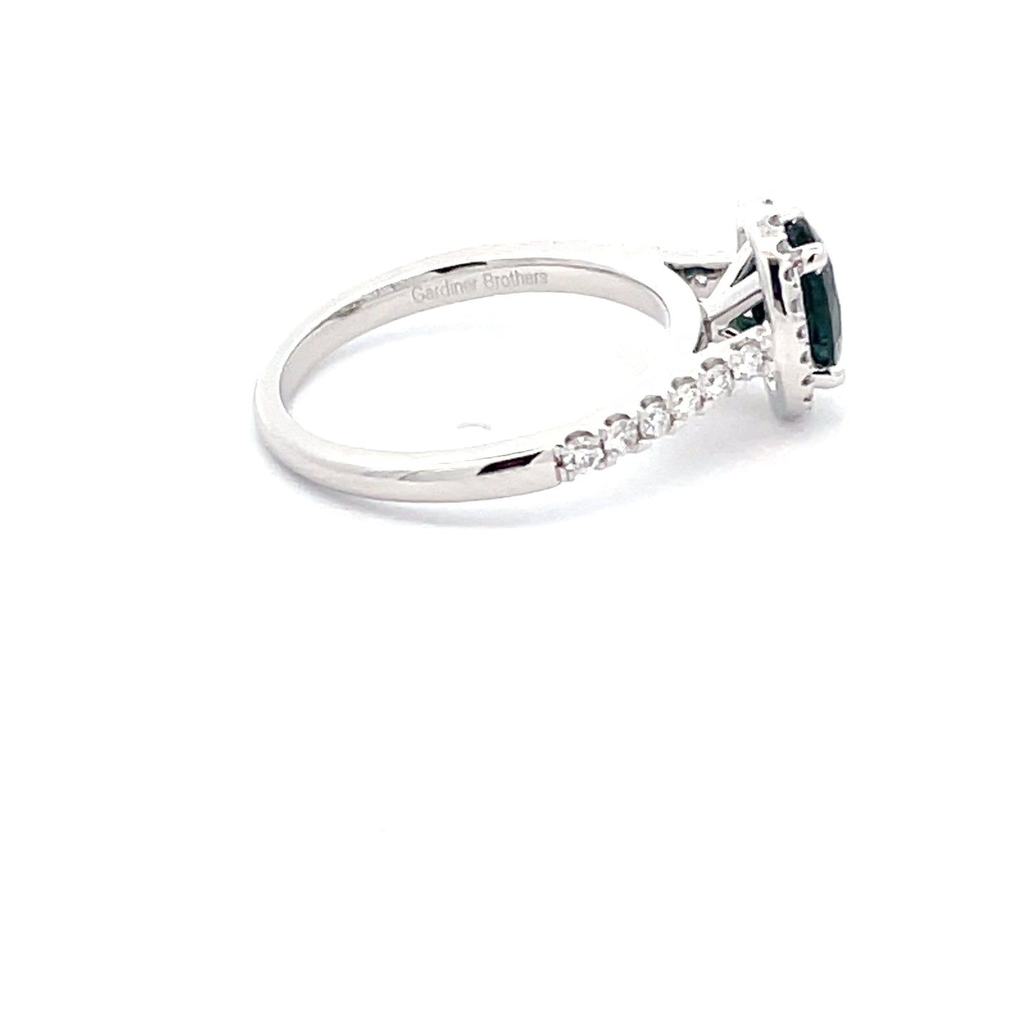 Teal Sapphire and Diamond Halo style Ring Gardiner Brothers
