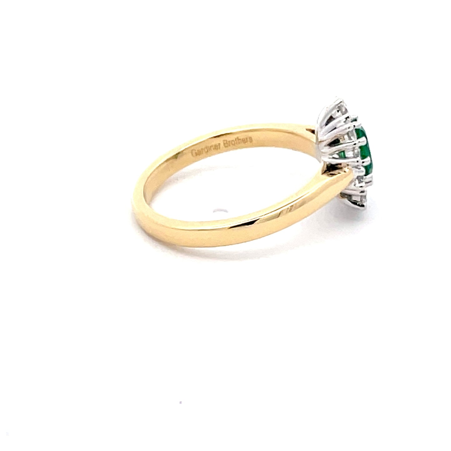 Emerald AND ROUND BRILLIANT CUT DIAMOND CLUSTER STYLE RING Gardiner Brothers