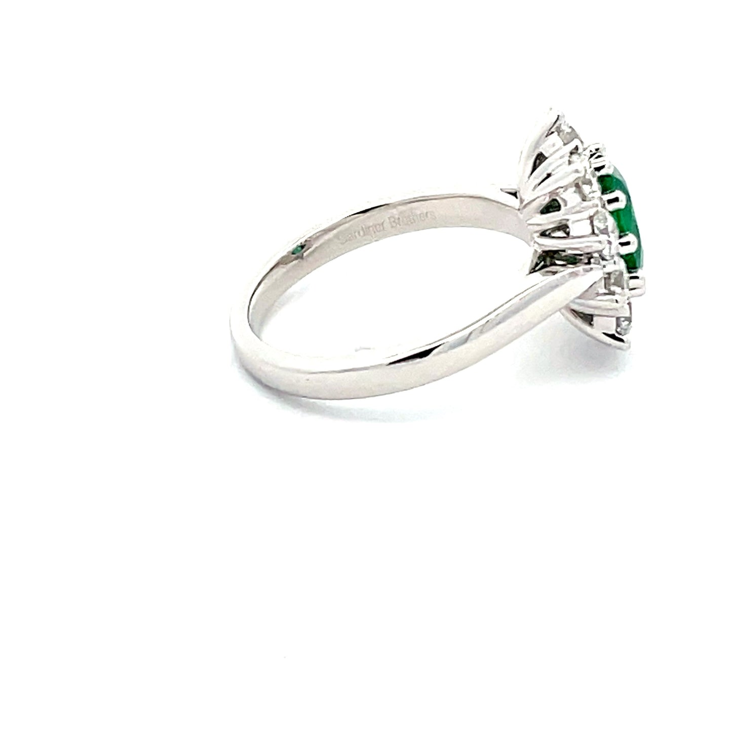 emerald AND ROUND BRILLIANT CUT DIAMOND CLUSTER STYLE RING Gardiner Brothers