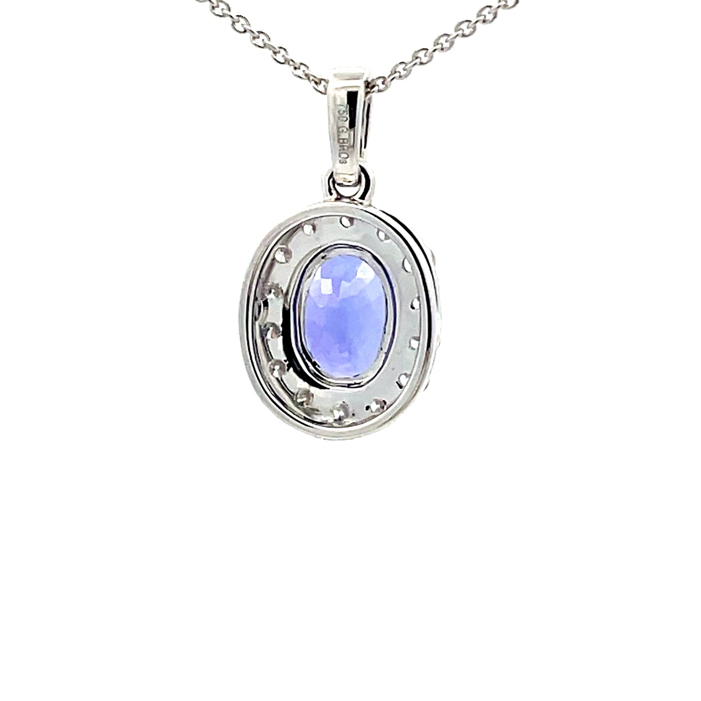 Tanzanite and diamond Halo Style Pendant Gardiner Brothers
