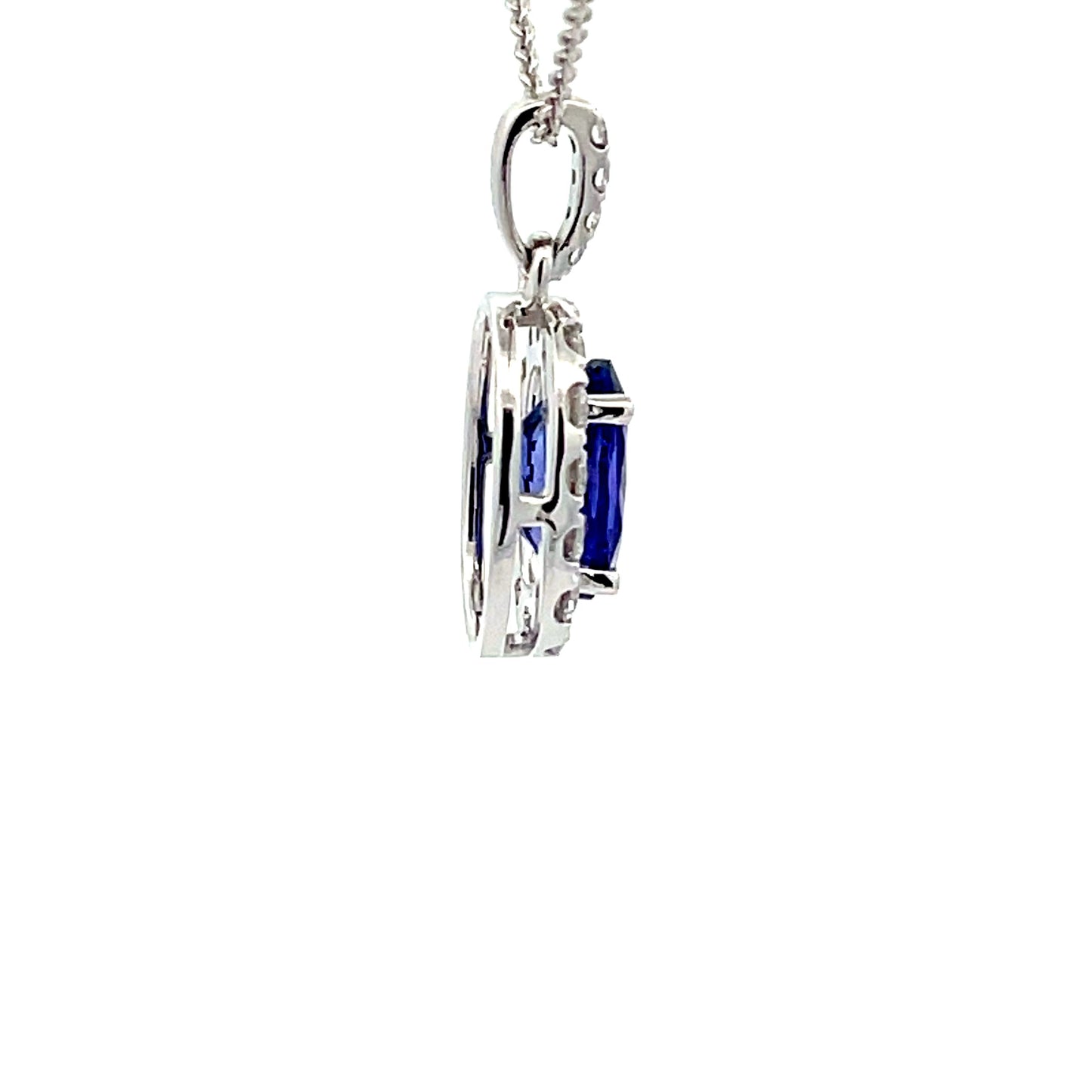 Tanzanite and diamond Halo Style Pendant Gardiner Brothers