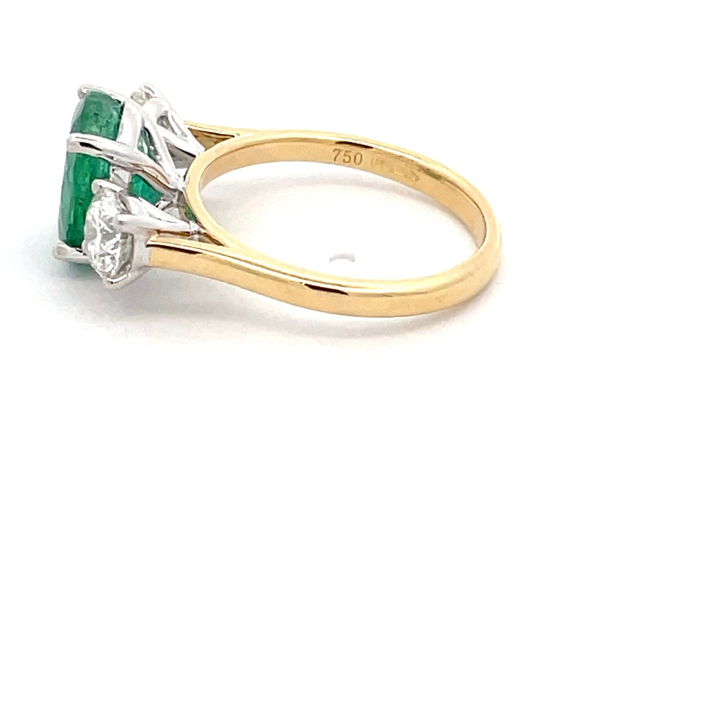 Emerald and round brilliant cut diamond 3 stone ring Gardiner Brothers