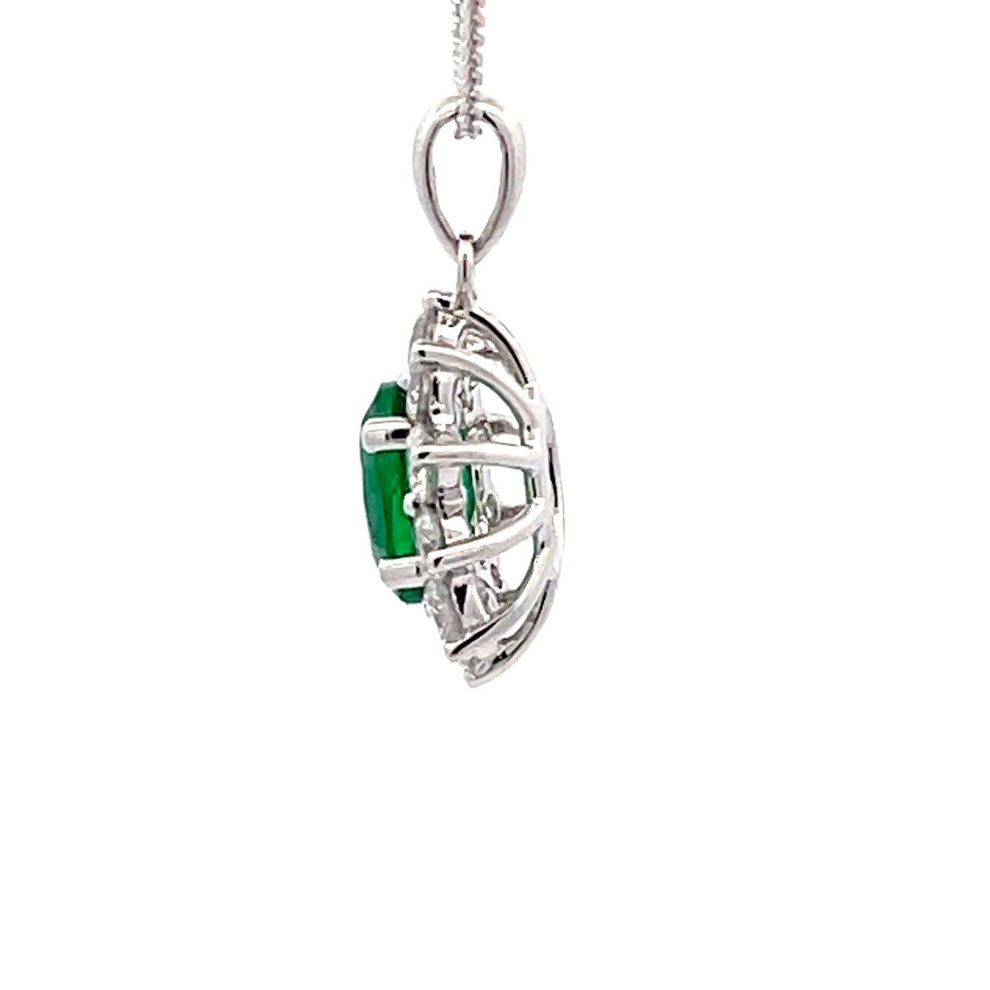Emerald and Round brilliant cut diamond cluster style pendant Gardiner Brothers
