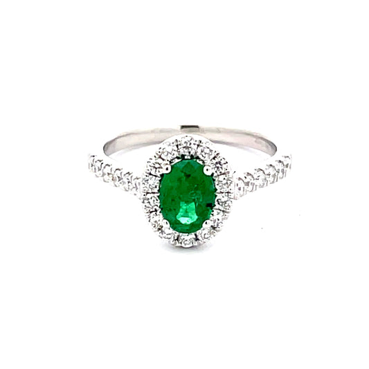 Emerald and round Brilliant Cut diamond halo style ring  Gardiner Brothers
