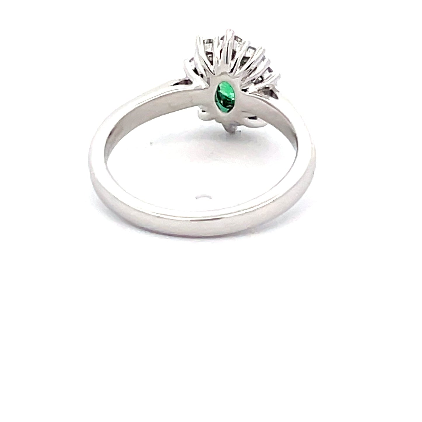 Emerald and round brilliant cut diamond cluster style ring Gardiner Brothers