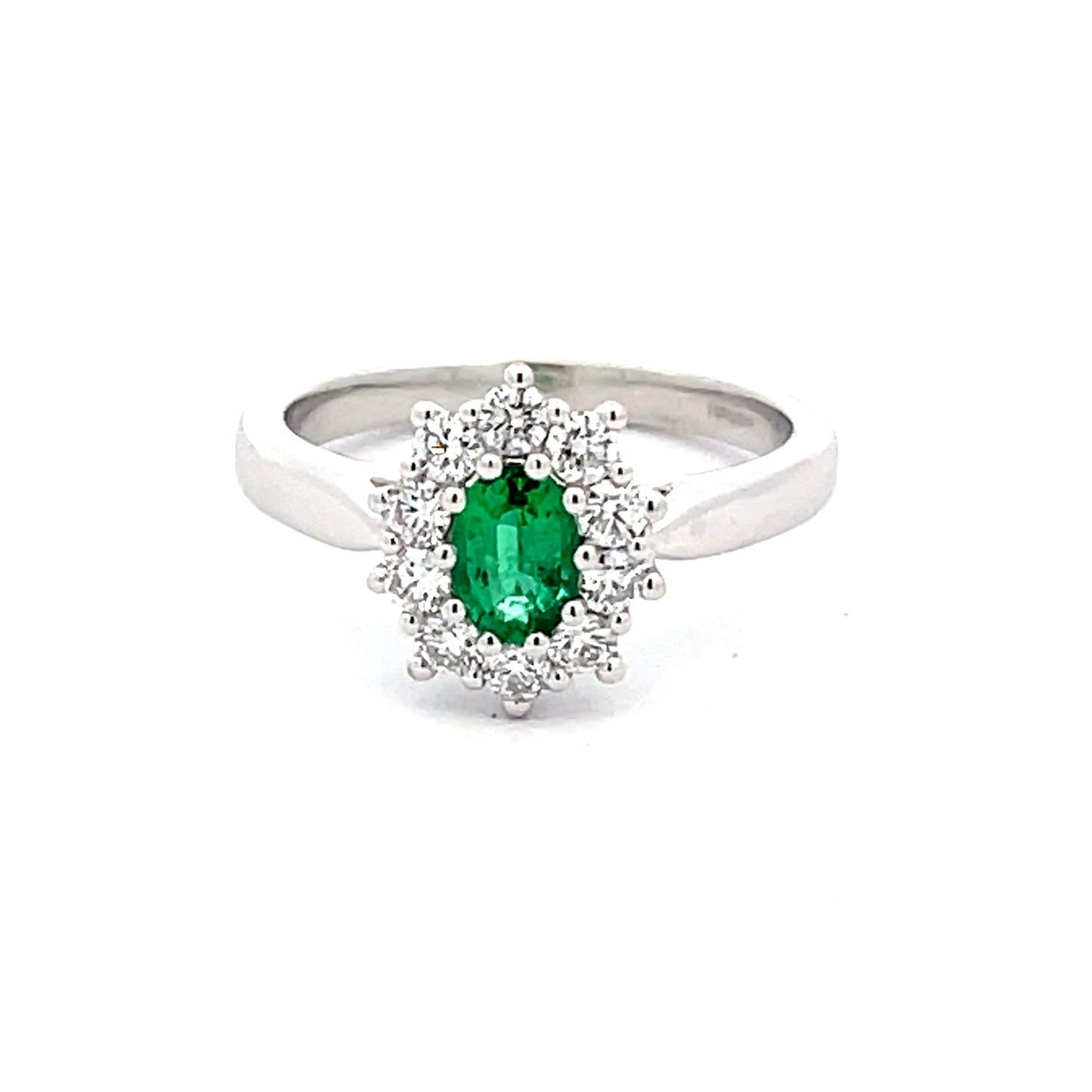 Emerald and round brilliant cut diamond cluster style ring Gardiner Brothers