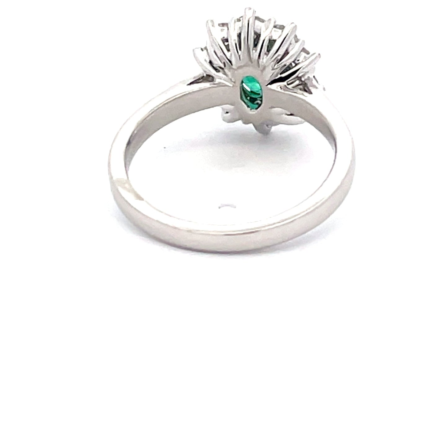 Emerald and round brilliant cut diamond cluster style ring Gardiner Brothers