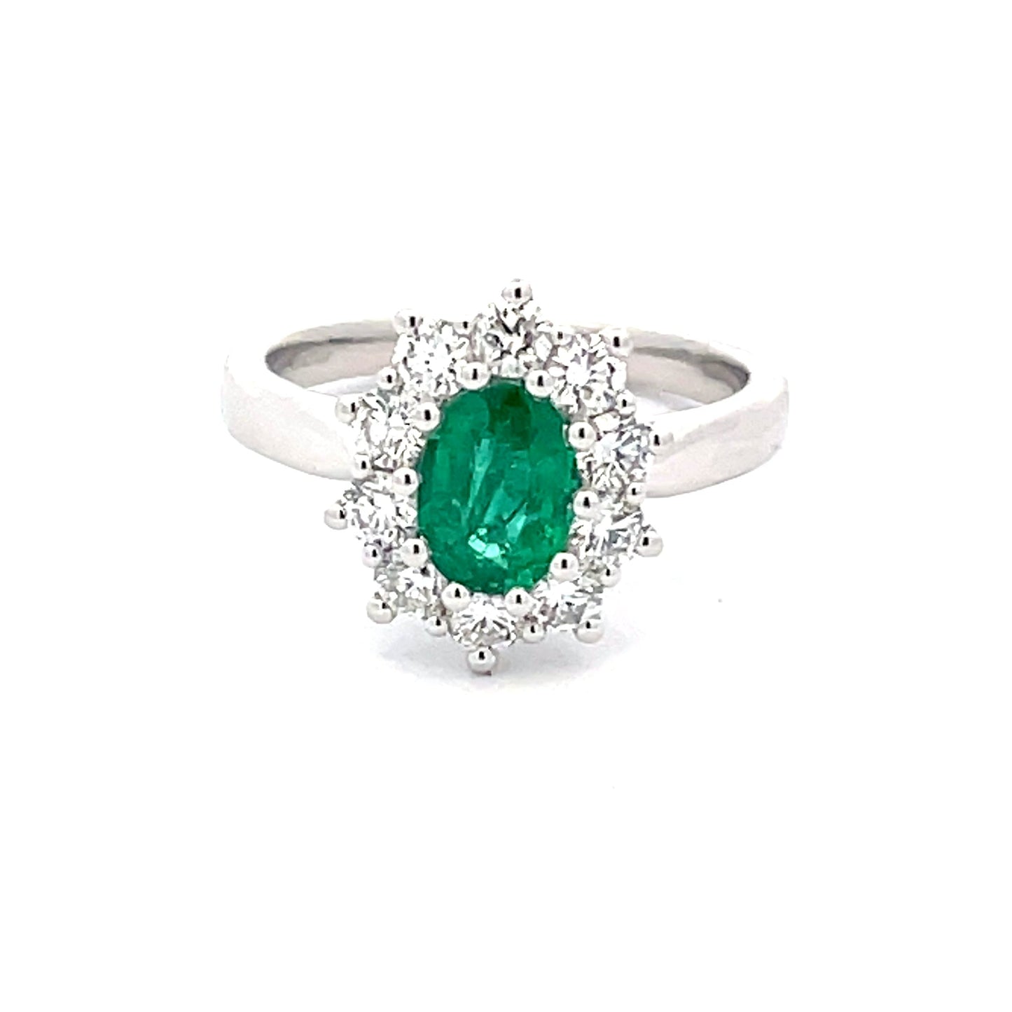 Emerald and round brilliant cut diamond cluster style ring Gardiner Brothers