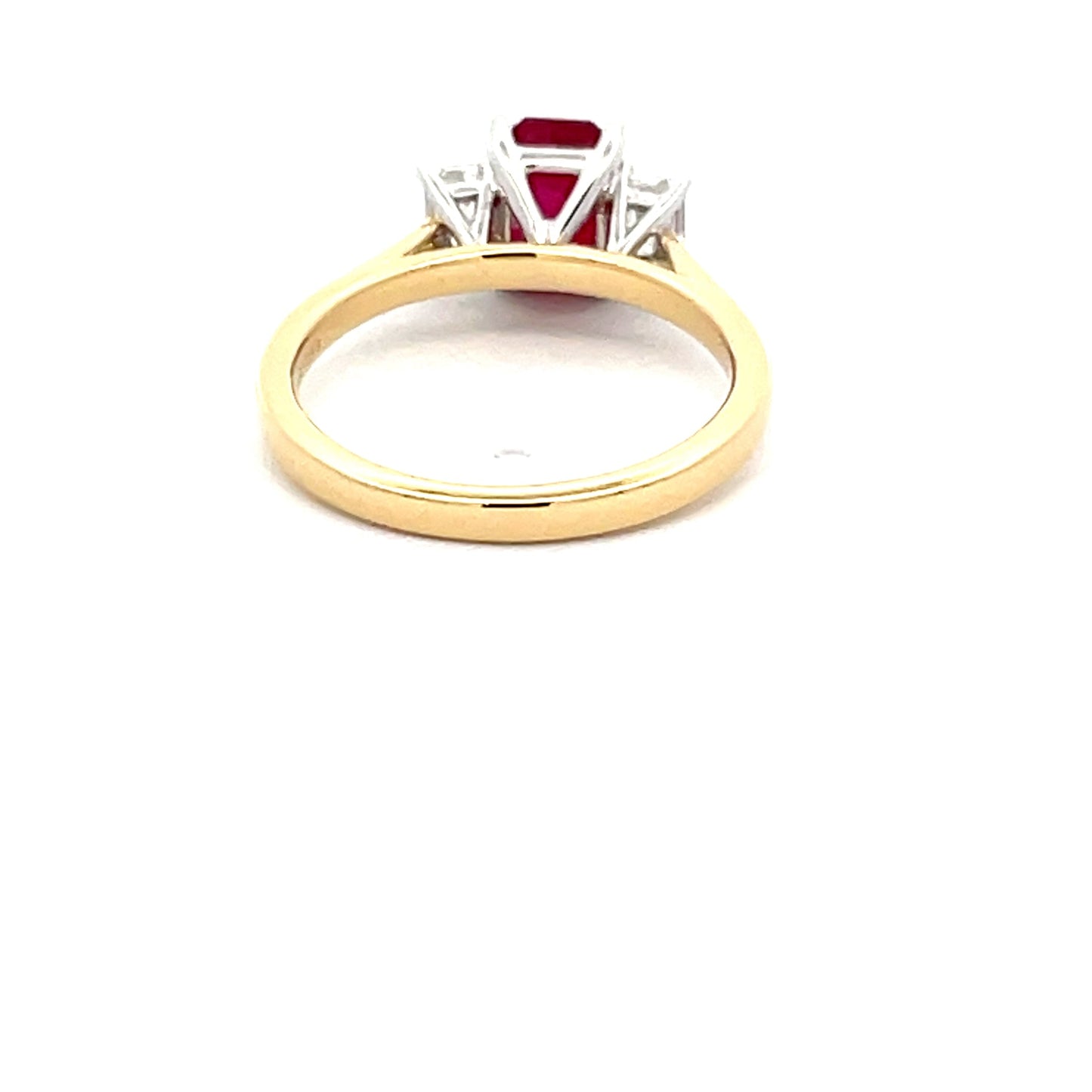 Octagonal Ruby and emerald cut diamond 3 stone ring Gardiner Brothers