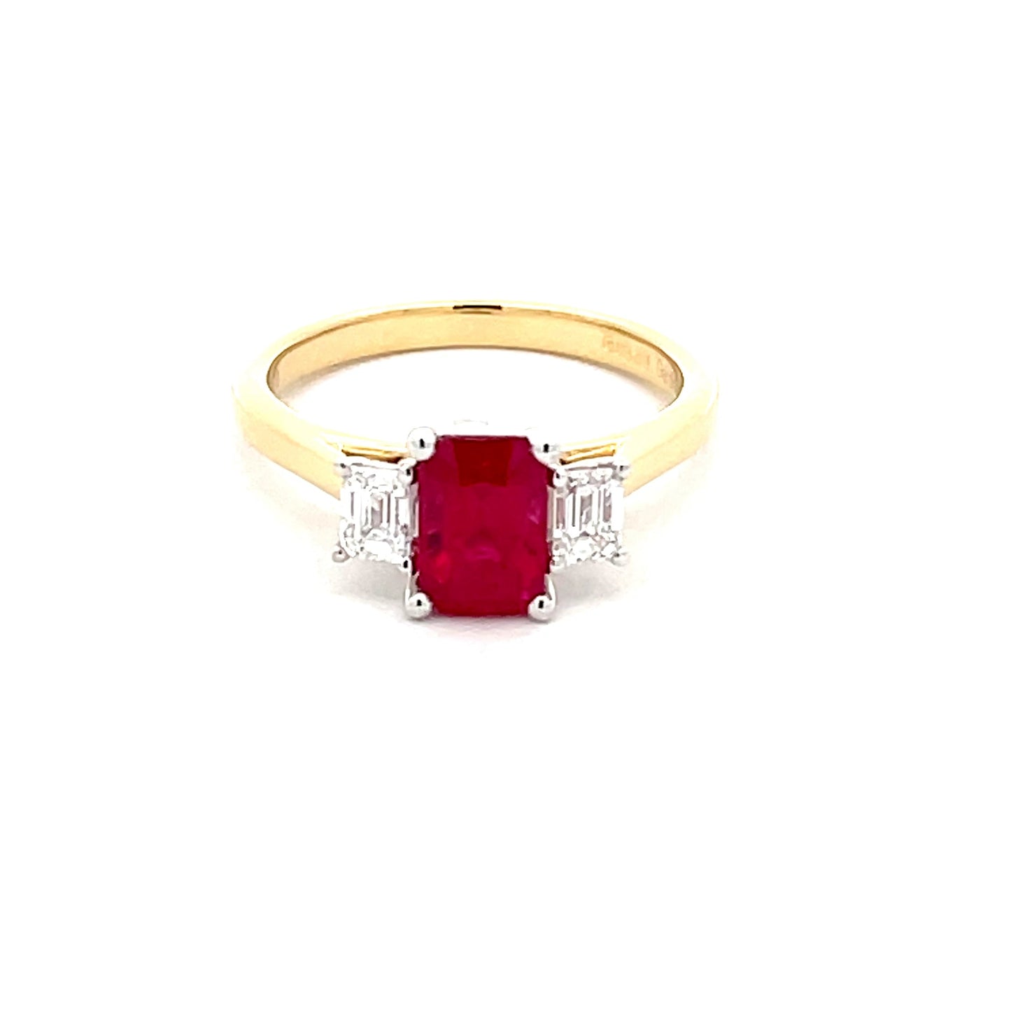 Octagonal Ruby and emerald cut diamond 3 stone ring Gardiner Brothers