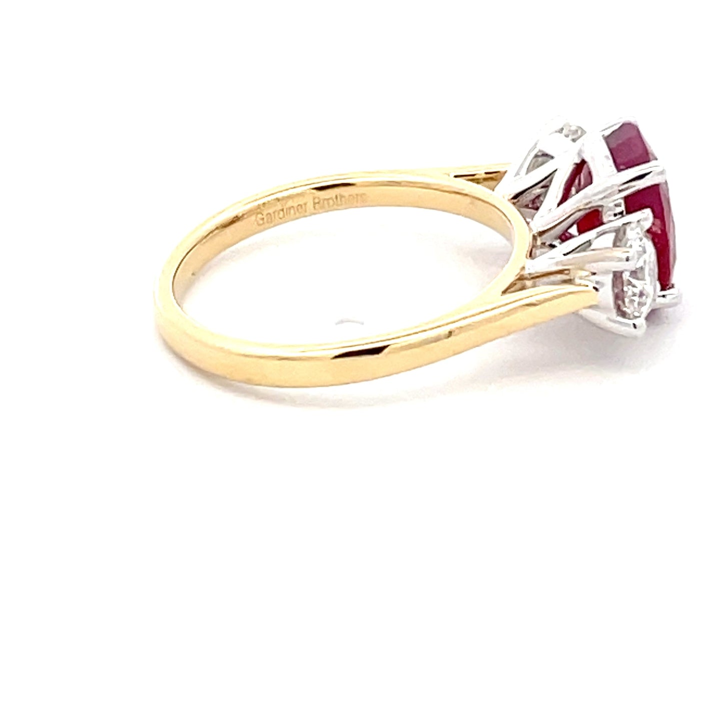 Ruby and Round Brilliant Cut Diamond 3 Stone ring Gardiner Brothers